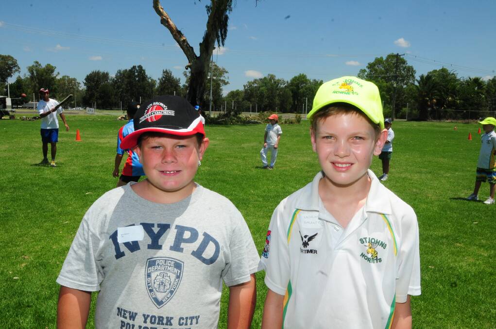 CRICKET WORKSHOP: Jack Walkom and Lachlan Galante.  Photo: LOUISE DONGES. 