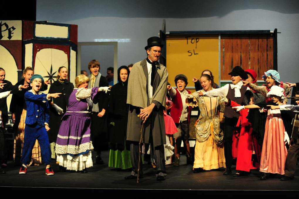 The cast of the classic tale A Christmas Carol rehearsing in full costume before their opening night on Friday. Photo: BELINDA SOOLE