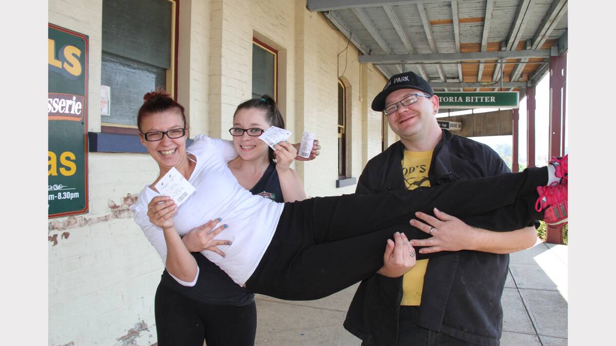  Nikki Shearam, Danielle Reid and Daryl Brown at the Federal Hotel with their tickets. Photo: Wellington Times. 
