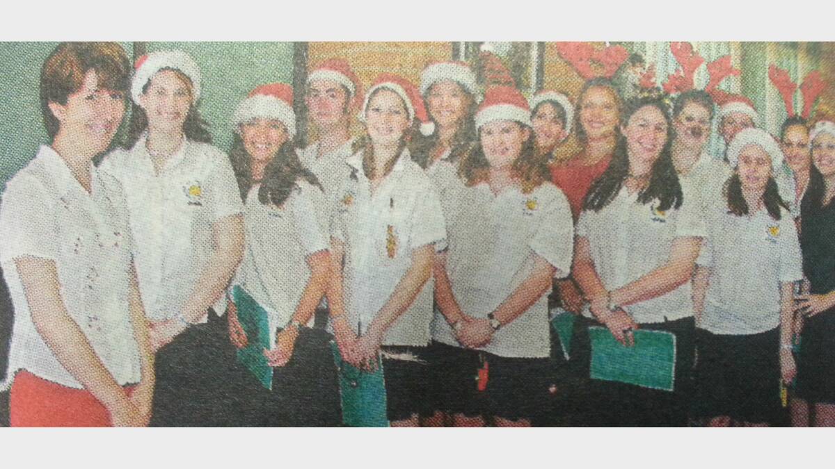 Michelle Thompson, Lauren Burke, Emily Buster, Tegwyn Chapman, Veronica Campbell, Kim Dover, Ashleigh Brooks and Emma Turley with class mates. 