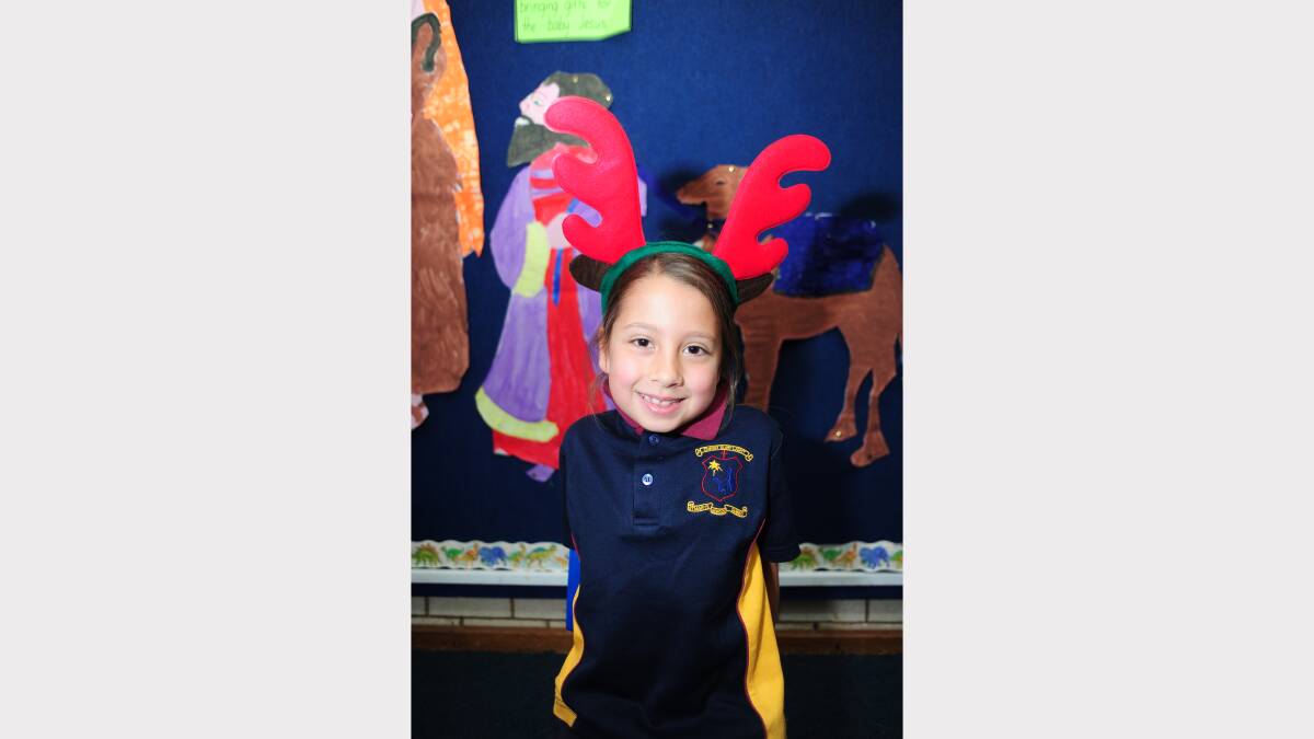ALL I WANT FOR CHRISTMAS: St Mary's Primary School kindergarten student Charlotte Cooke would like a rabbit. 