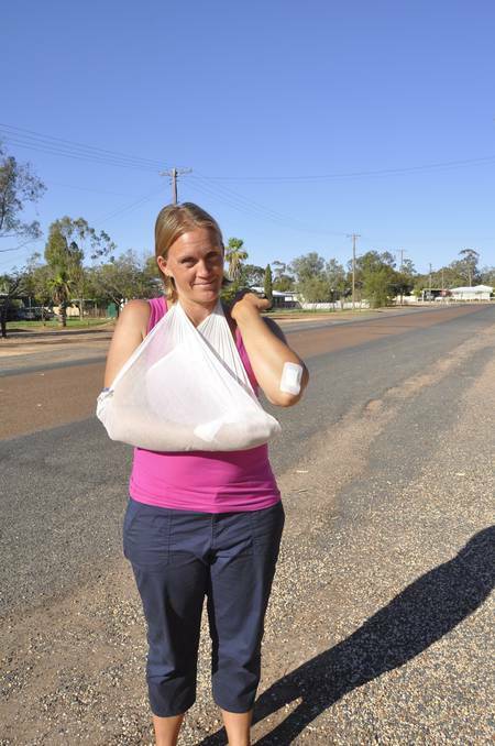 LIGHTNING RIDGE: Charlotte Mallouk following the attack by a large dog as she was running.