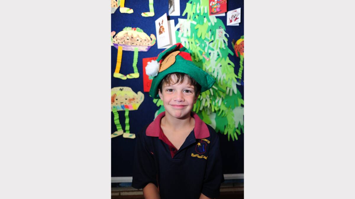 ALL I WANT FOR CHRISTMAS: St Mary's Primary School kindergarten student James Aird would like a mini ipad and a four-wheeler motorbike. 