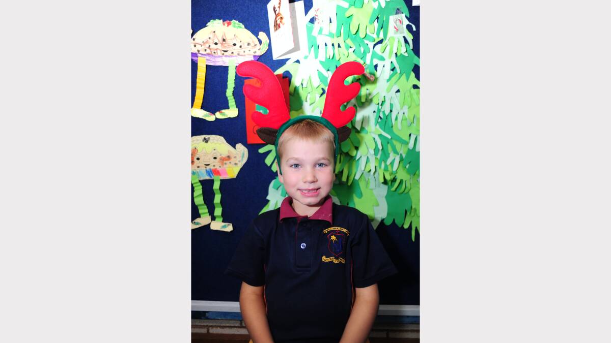 ALL I WANT FOR CHRISTMAS: St Mary's Primary School kindergarten student Julian Caton-New would like an ipod. 