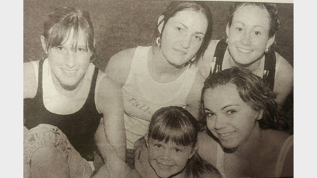 Elise Willetts, Ebany Howard, and Racheal Dickinson with Tamika and Kylie Simpson. 