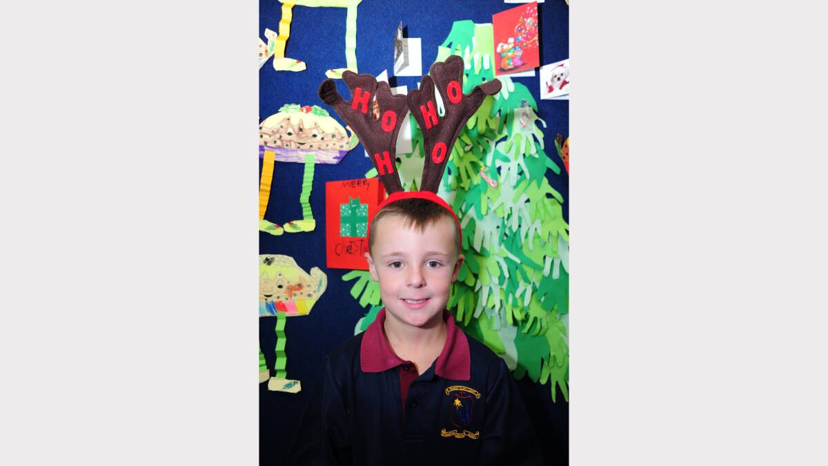 ALL I WANT FOR CHRISTMAS: St Mary's Primary School kindergarten student Billy Hing would like an ipad. 