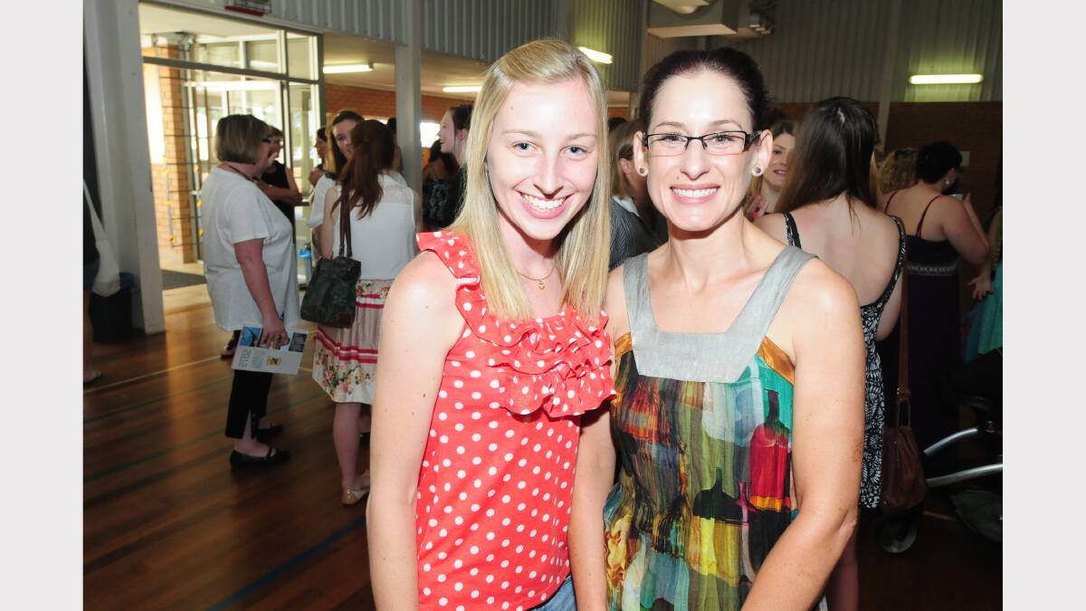 Students and teachers at St Johns College celebrated the release of the HSC results and their ATAR on Thursday morning. Pictured are  Stephanie Webster and Amber Carter. 
