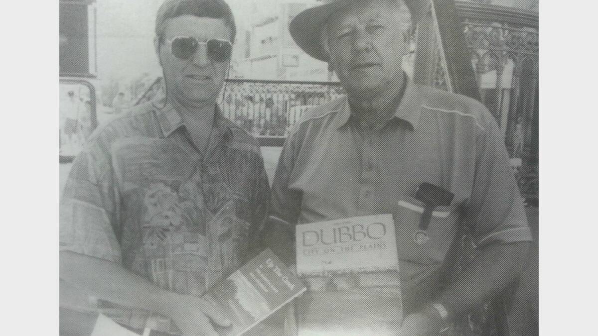 #TBT JANUARY 1993:  Daily Liberal editor Barry Hildebrandt (left) presents the prizes to the winner of last year's Australia Day Bush Verse Competition Max Overton. 