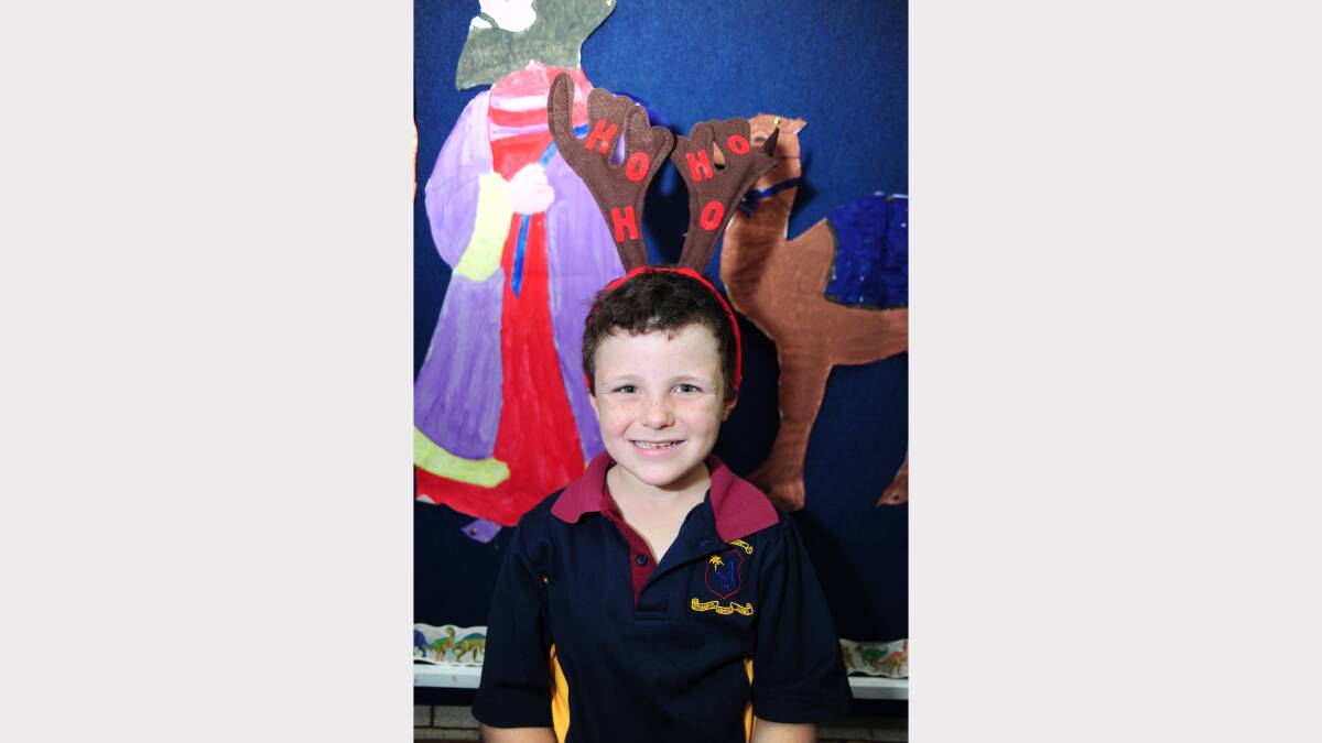 ALL I WANT FOR CHRISTMAS: St Mary's Primary School kindergarten student Harry Walsh would like a Rip Curl hat and a motorbike. 