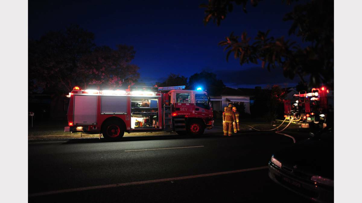 Firefighters were called to a shed alight in Palmer Street on Monday night. Photo: Belinda Soole.