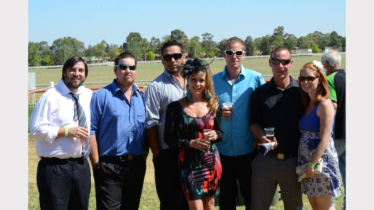 Oliver Gray, Brad Madigan, Doug Peckham, Ben Cameron, Behn and Kelly Momley from Dubbo Landscape and Gardening with Adele O'Donoghue (front) from the Daily Liberal