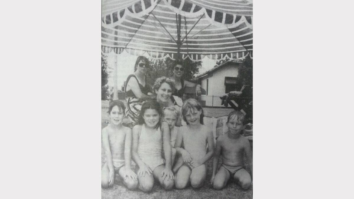 JANUARY 1993: At the pool were Clinton and Alissa West, Brianna and Kiel Wheeler, Jenny holding Micaela Wheeler, Louise Griffith and Mazine West. 