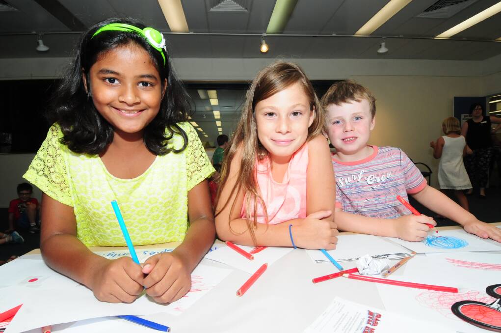 SUMMER READING PROGRAM: Sathmi Herath, Chelsea Ladas and Carter Clifford. Photo: LOUISE DONGES. 