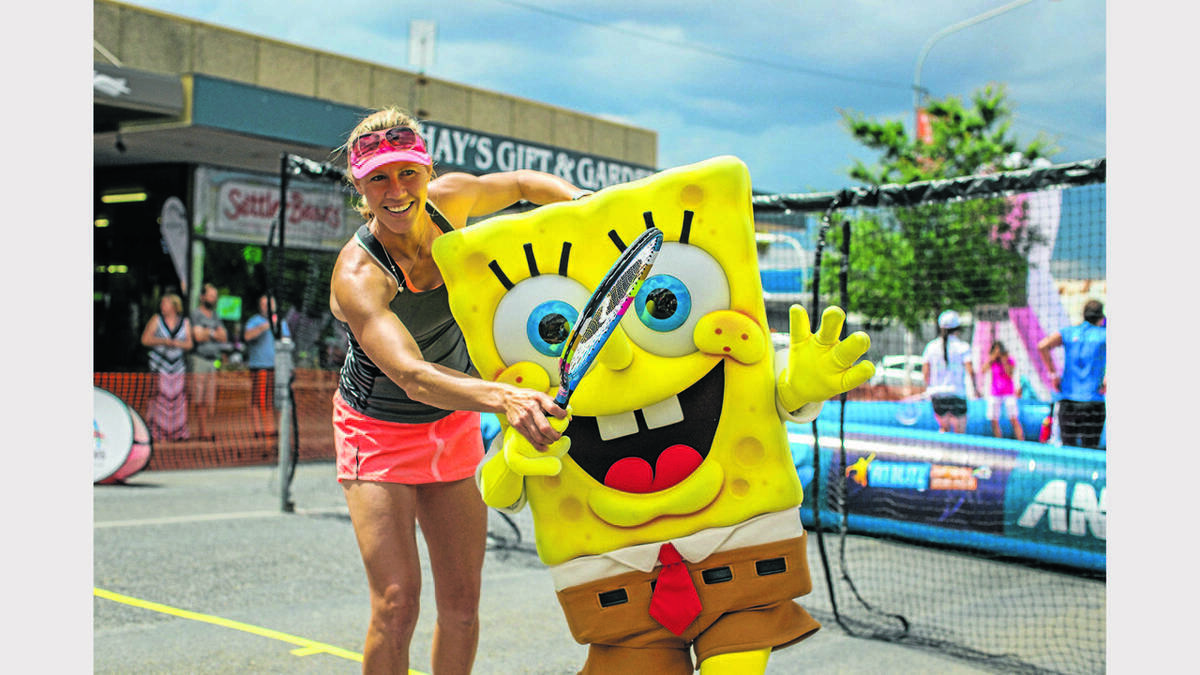 Alicia Molik helped SpongeBob with his forehand. Photos: Hank Paul