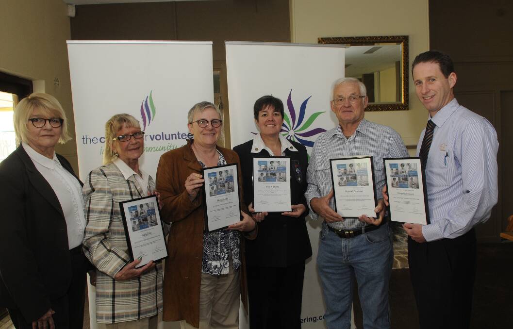Centre for Volunteering CEO Lynne Dalton, Taronga Western Plains Zoo's Betty Daly (winner of the Orana/FarWest Volunteer of the year), Lachlan Landcare's Margot Jolly from Parkes, Vivian Evans from Coonabarabran (Regional Leaders Girls Guides), Russell Spence from Forbes Fishcare and Mark Hodges from Orange for Orange Bush Nippers Club. 	   Photo: WESTERN ADVOCATE