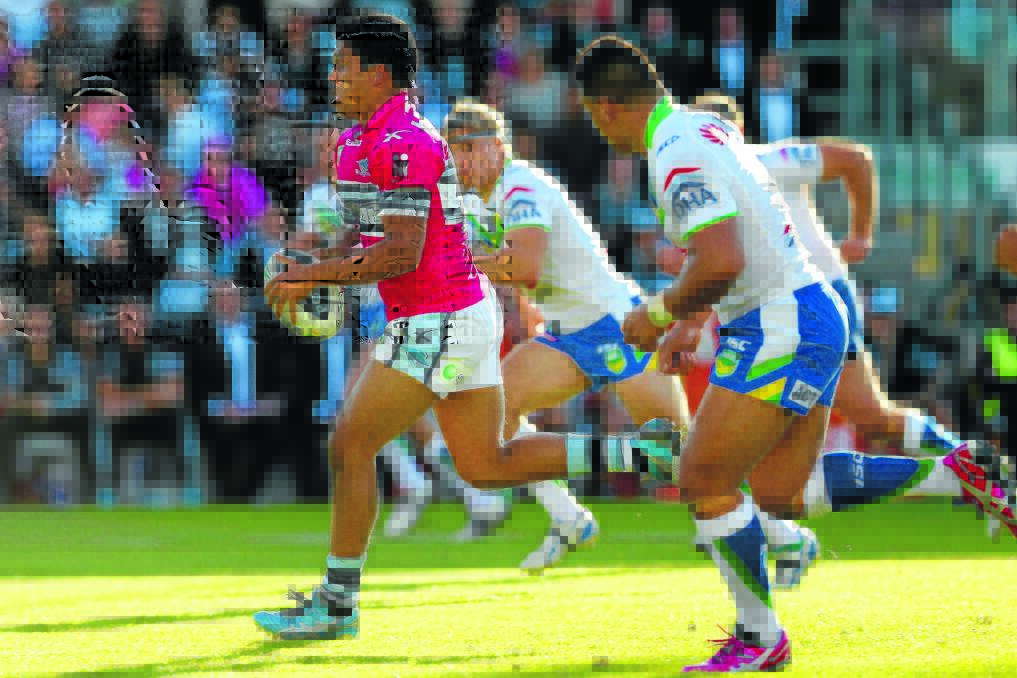 Wellington product Tyrone Peachey makes a break during his NRL debut for the Sharks against the Canberra Raiders at Sharks Stadium.  Photo: GETTY IMAGES
