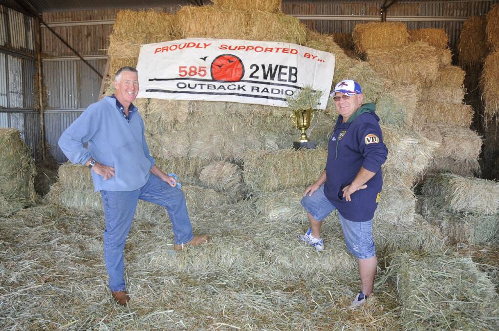 Oaten hay category winner Tim Moses and Neil Hamnett from Australian Hay Merchants. Photo: BELINDA SOOLE.
