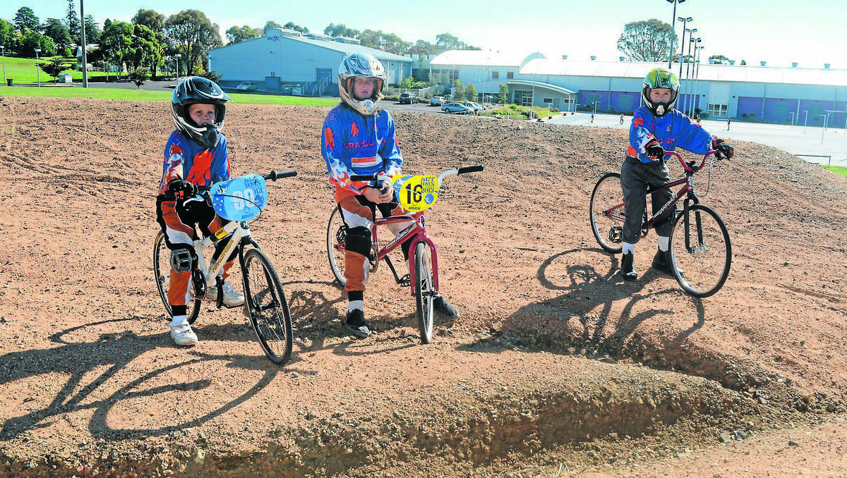ORANGE: Tyarna Pavy, Zac Pavy and Aaron Rodgers hope the BMX track upgrade will go ahead. Photo: CLARE COLLEY. 0325ccbmx4