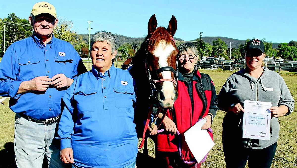 MUDGEE: Riding for the Disabled president Sandy Walker with regular rider Gwen Davis, Magic, and newly graduated assistant coaches Kay Bushnell and Renee Bridger.