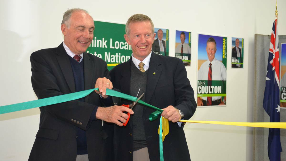DUBBO: The Nationals leader Warren Truss cutting the ribbon to officially launch Member for Parkes Mark Coutlon's election office. Photo: ABANOB SAAD