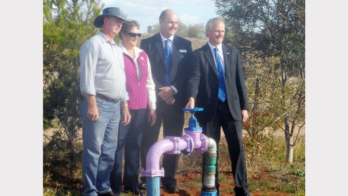 PARKES: Tullamore Show representatives, Tom McMahon (vice president), Bernadette Boneham (president), Parkes Deputy Mayor Alan Ward and Shire General Manager, Kent Boyd following the turning on of the grey water system. in Tullamore on Wednesday.