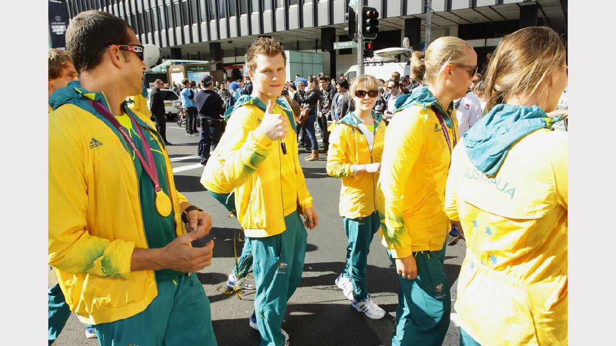 Crowds line George St and in front of the Town Hall for the official welcome home of the 2012 Australian Olympic Team  