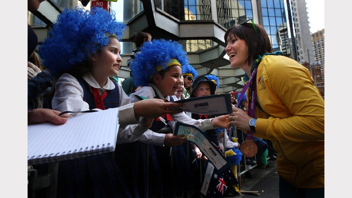 Cyclist Anna Meares during the Welcome home to the Australian Olympians parade down George Street, Sydney.