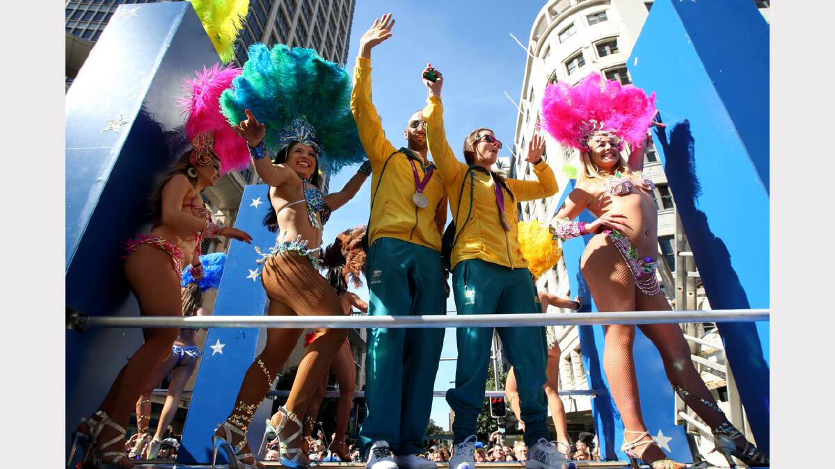 Australia's Olympians celebrate during today's welcome home parade in Sydney.