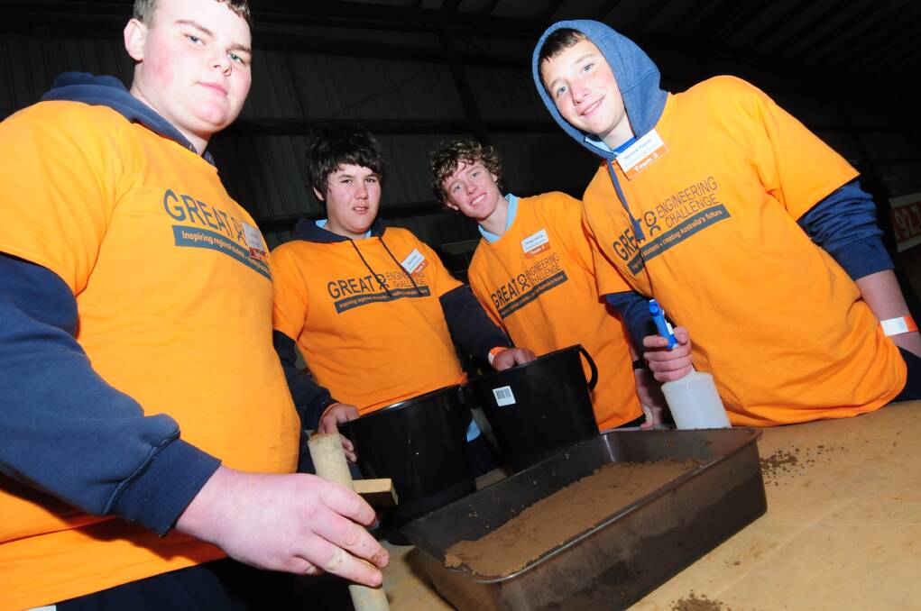 Condobolin High School students Alec Rich, Jayden Krebs, Michael Hocking and Matthew Pawsey at the road building activity. Photo: Photo: LOUISE DONGES