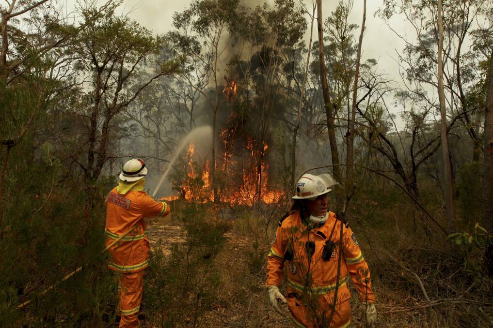 An RFS strike team converges on Bells Line of Road near Mt Victoria. 	Photo: Dean Sewell