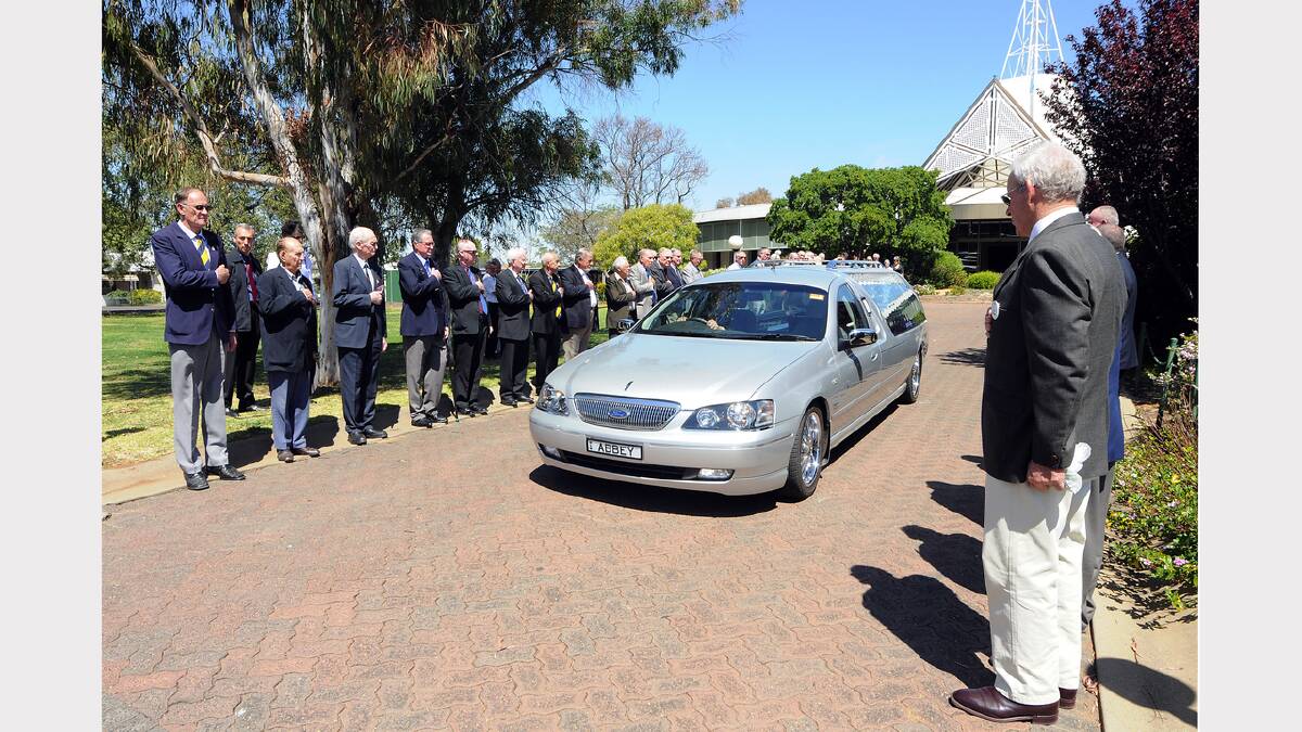 Friends and family formed a guard of honour at the funeral of Kevin Hopkins at St Brigid’s Catholic Church yesterday. FULL STORY PAGE 6. 		         Photo: BELINDA SOOLE
