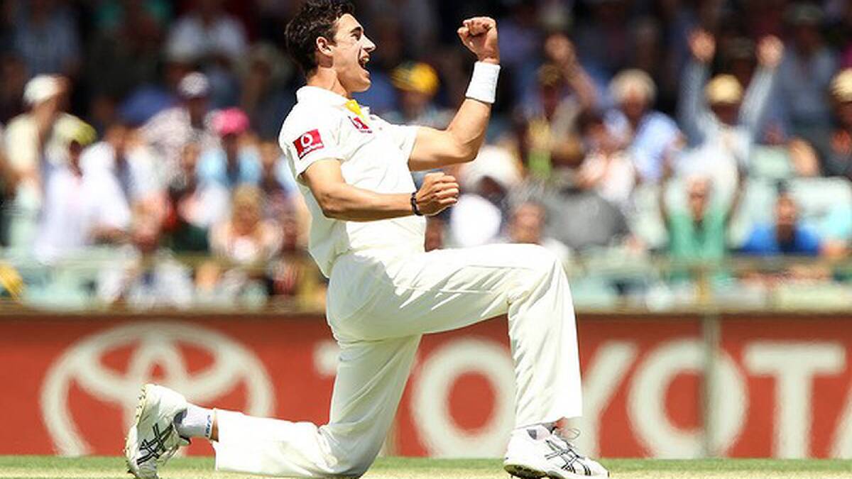 Mitchell Starc of Australia celebrates for the wicket of Alviro Peterson of South Africa before it was overturned by video review. Photo: Getty Images