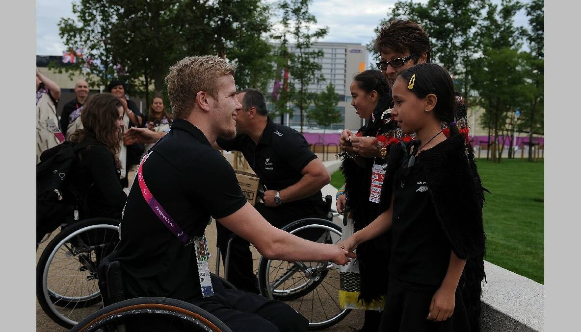 Cameron Leslie of New Zealand is welcomed during the New Zealand Flag Raising Ceremony at the Olympic Park on August 27, 2012 in London, England. (Photo by Christopher Lee/Getty Images)