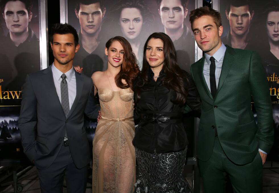 Actors Taylor Lautner, Kristen Stewart, author Stephenie Meyer, and actor Robert Pattinson arrive at the premiere of Summit Entertainment's 'The Twilight Saga: Breaking Dawn - Part 2' at Nokia Theatre L.A. Live on November 12, 2012 in Los Angeles, California. Photo by Christopher Polk/Getty Images