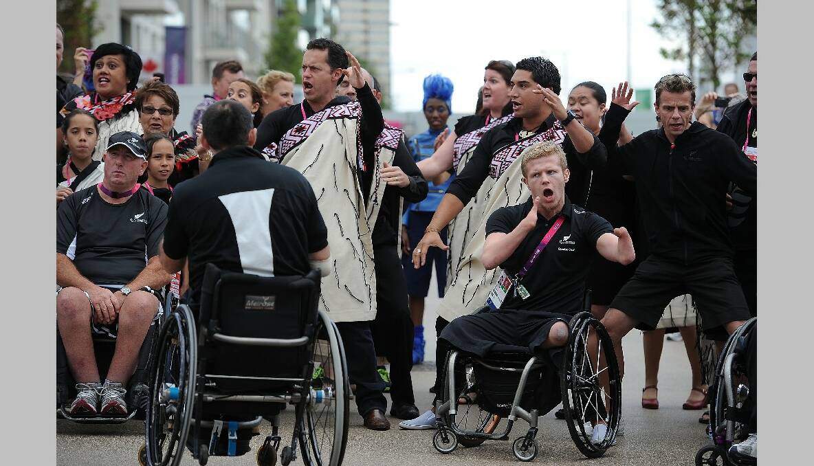 Tim Prendergast (R) and Cameron Leslie (Front 2nd R) of New Zealand Perform the Haka during the New Zealand Flag Raising Ceremony at the Olympic Park on August 27, 2012 in London, England. (Photo by Christopher Lee/Getty Images)