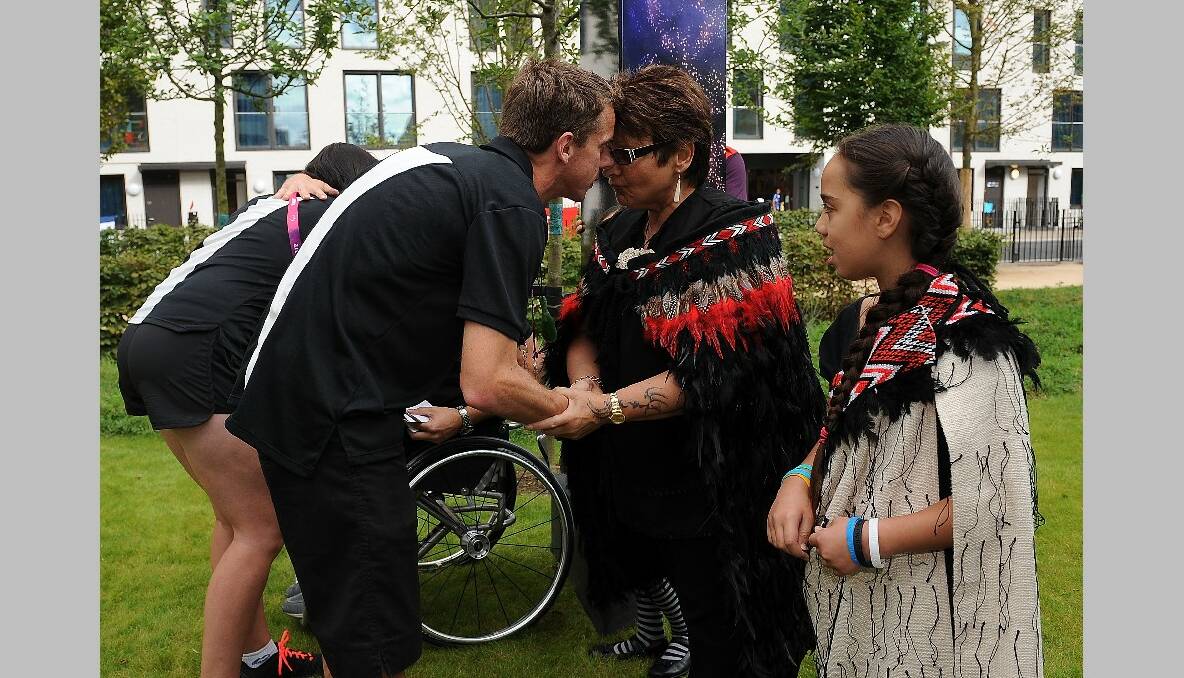 Tim Prendergast of New Zealand is welcomed with a traditional Maori greeting during the New Zealand Flag Raising Ceremony at the Olympic Park on August 27, 2012 in London, England. (Photo by Christopher Lee/Getty Images)