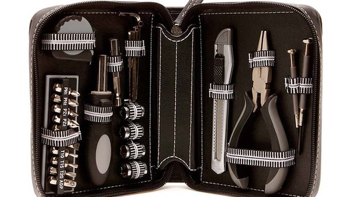 Handy man ... 24 piece mini tool kit with leather case, $28. Available at: www.malebox.net.au/
