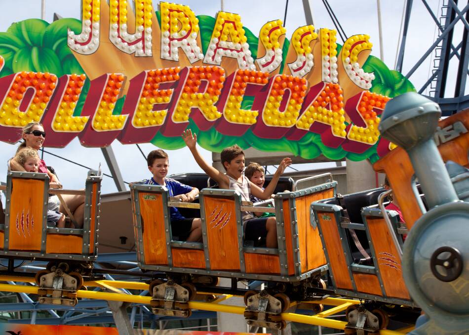 Evan Garcia-Rojas and Javi Daghero on a rollercoaster at the Royal Easter Show in Sydney. Photo: Janie Barrett