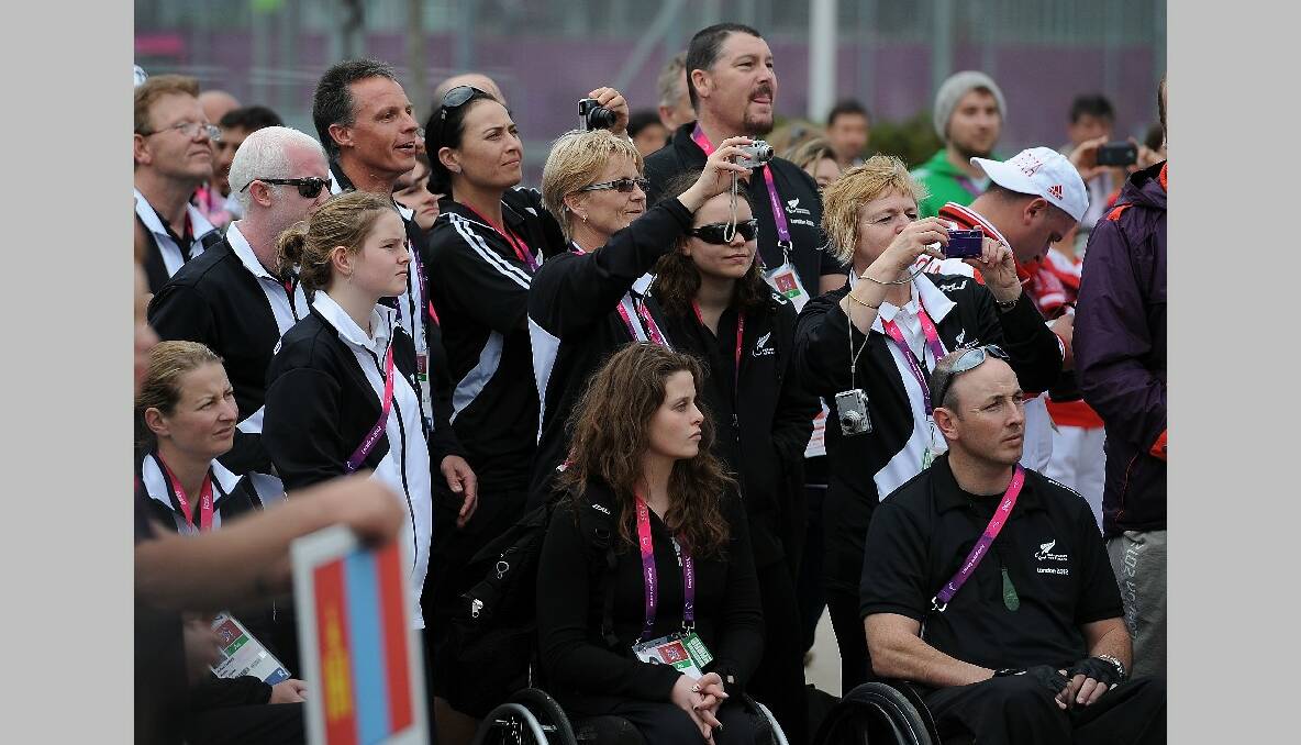 The New Zealand Team watch the performers during the New Zealand Flag Raising Ceremony at the Olympic Park on August 27, 2012 in London, England. (Photo by Christopher Lee/Getty Images)