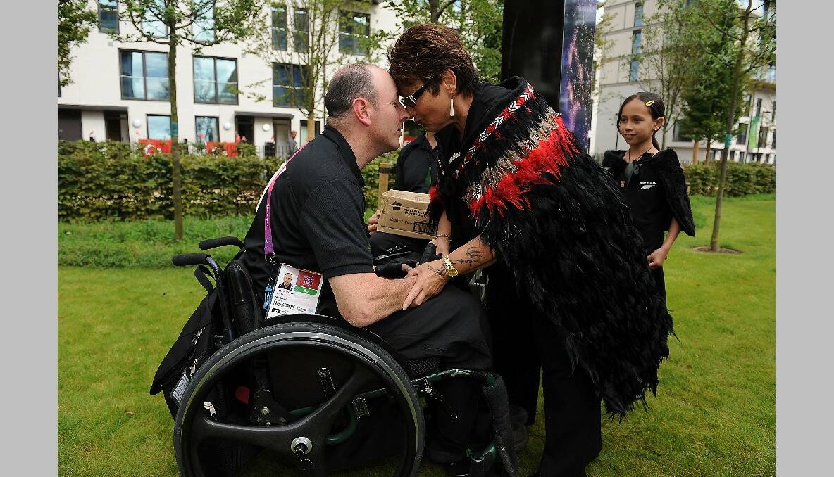 Michael Johnson of New Zealand is welcomed with a traditional Maori greeting during the New Zealand Flag Raising Ceremony at the Olympic Park on August 27, 2012 in London, England. (Photo by Christopher Lee/Getty Images)