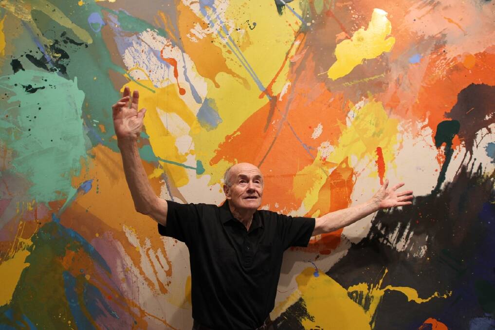 Artist Sydney Ball in front of his art work 'Oceania', on display as part of his exhibition 'The Stain Paintings' 1971-1980 at Sullivan & Strumpf Gallery in Zetland, Sydney. Photo: Tamara Dean 