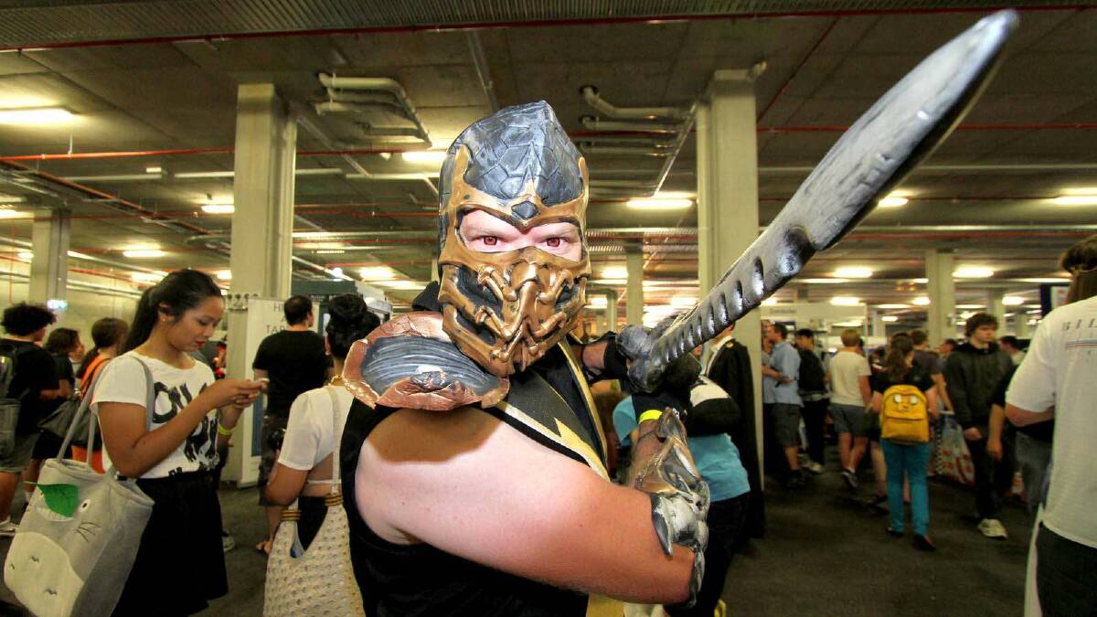 Micah Glasson dressed as Scorpian from Mortal Kombat at the Supanova Pop Culture Expo in Brisbane. Picture: Michelle Smith