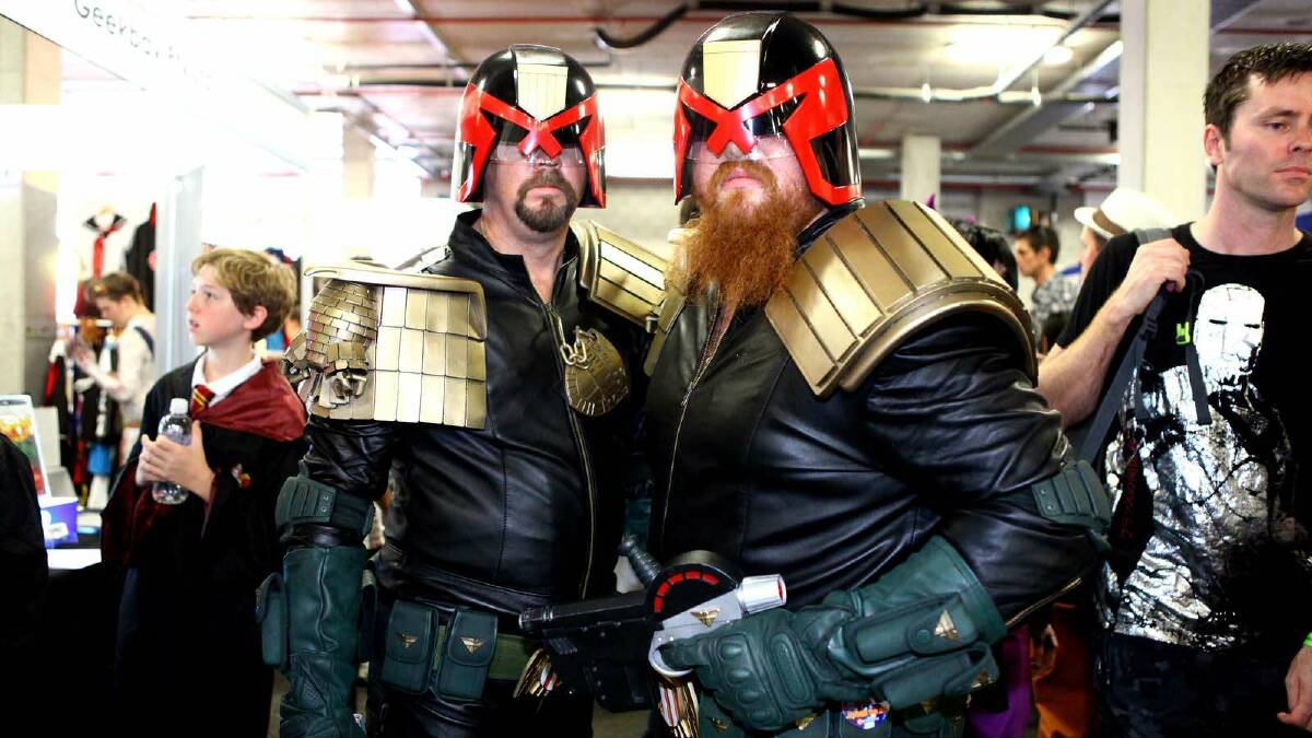 Mark Edwards and Justin Murphy dressed as Mega City Judges at the Supanova Pop Culture Expo in Brisbane. Picture: Michelle Smith