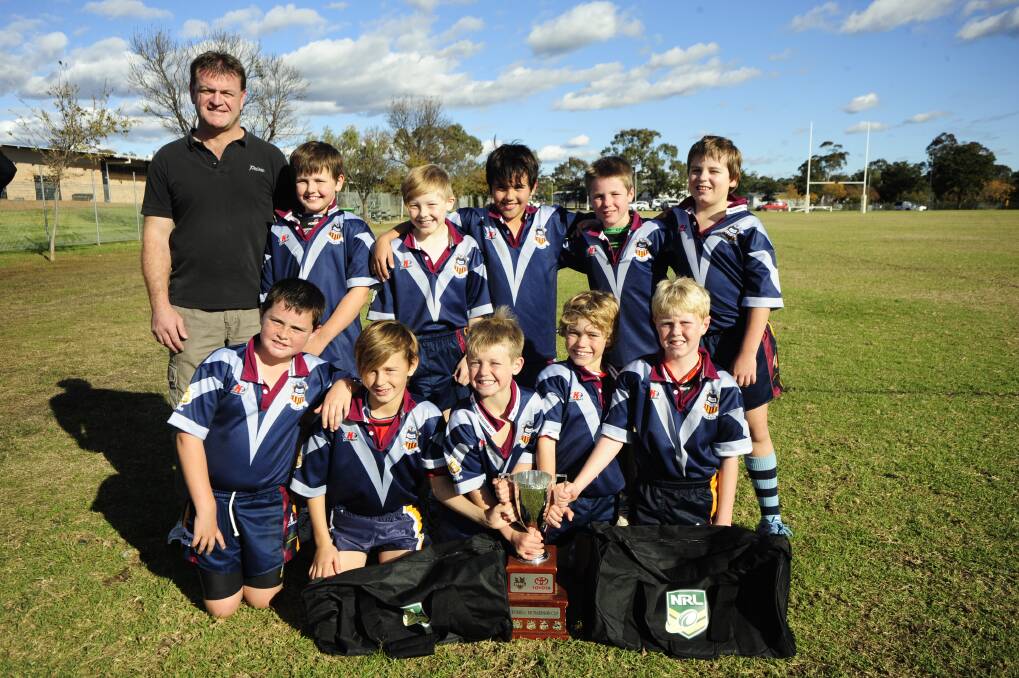 St Laurence’s Primary School took out the Russell Richardson Cup at Apex Oval yesterday. (BACK) St Laurence’s coach Brett Warwick with Aston Warwick, Darcy Richardson, Kye Stubbs, Darcy Chewings and Jett Lane, (FRONT) Harry Parnaby, Billy Monk, Rory Madden, Paddy Nelson and Beau McIntosh.	Photo: BELINDA SOOLE