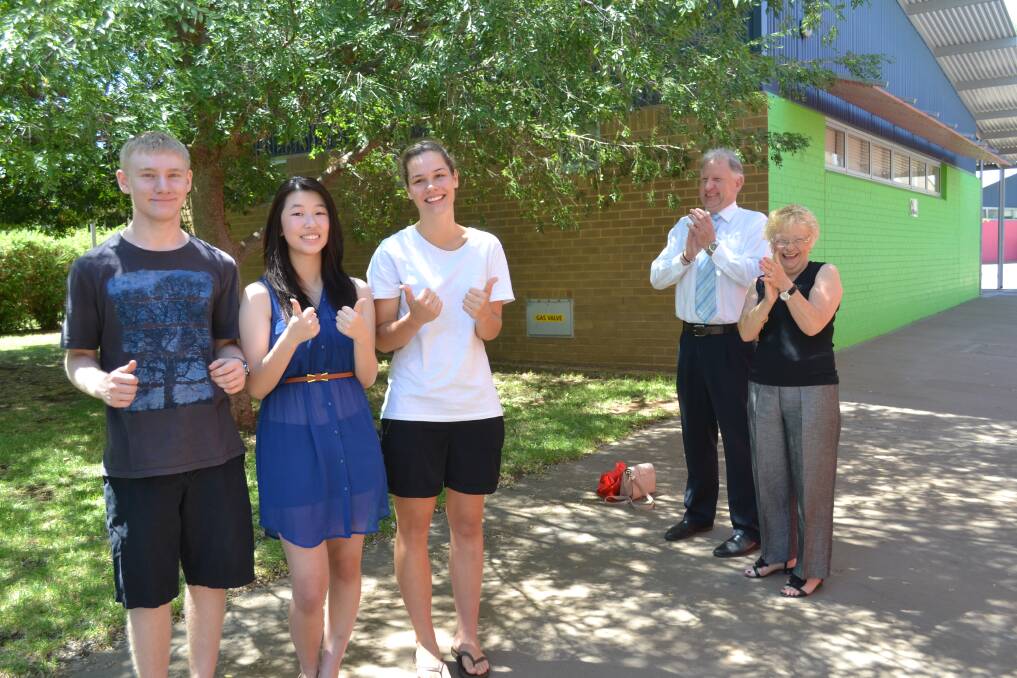 Dubbo College Senior Campus students Jason Tyrell, Hsin Su and Natasha Wykes were delighted with their HSC results, as were Dubbo College principal Andrew Jones and director Kerri Leigh-Gordon. 	       Photo: ABANOB SAAD