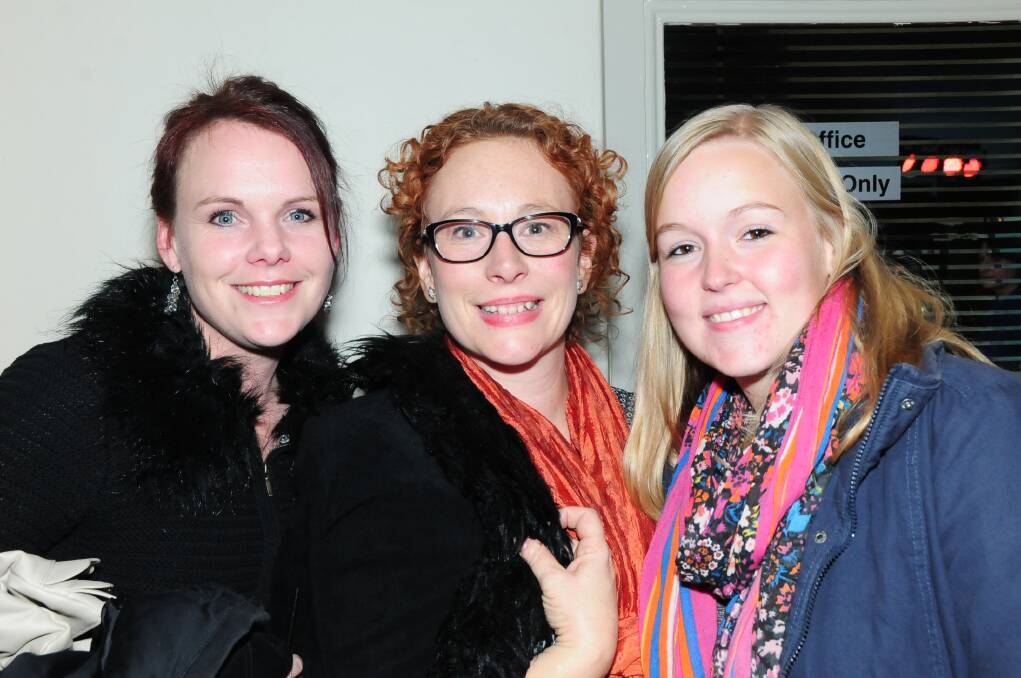 Belinda Elton, Rebecca Vis and Maud Minguet watching Mojo Juju at the Castlereagh Hotel. Photo: HOLLY GRIFFITHS