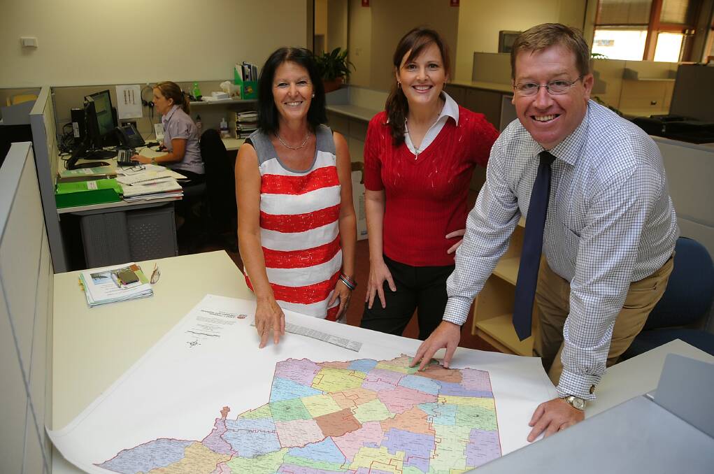Helping map a new direction for Crown Lands are executive general manager for Crown Lands Alison Stone, manager of the soon-to-be opened Dubbo Crown Lands Business Centre Corinne Shields and Dubbo MP Troy Grant.      	             Photo: BELINDA SOOLE