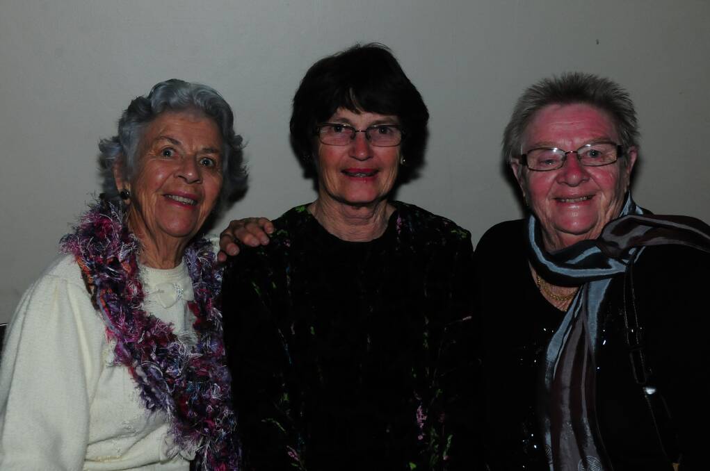 Joy Saunders, Di Clifford and Dulcie Erdman watching Mojo Juju at the Castlereagh Hotel. Photo: HOLLY GRIFFITHS