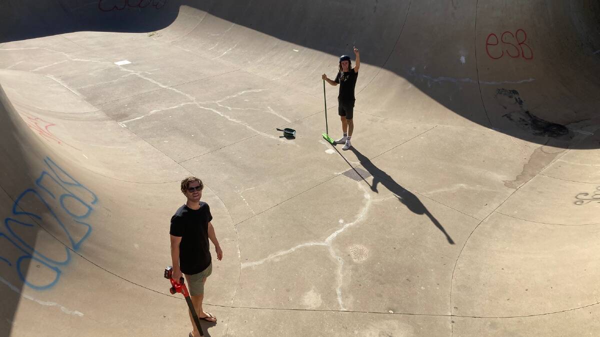 EAGER SKATERS: A group of local skaters were spotted last week cleaning up smashed glass and rubbish at the skate park. Photo: CONTRIBUTED