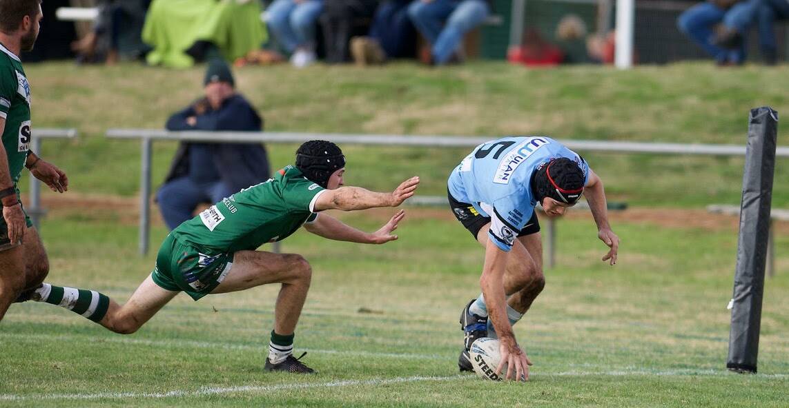 Gulgong winger Toby O'Leary crosses the line for his side in their game against Dunedoo on Saturday. Picture: Peter Sherwood Photography